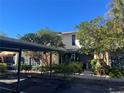 Townhome with carport and nicely landscaped grounds at 7312 Cloister Dr # 7312, Sarasota, FL 34231