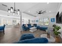 Bright living room featuring comfortable seating and an open floor plan at 11216 Coralbean Dr, Lakewood Ranch, FL 34202