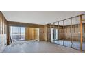 Interior under construction, showing an open space with ocean views and tile flooring at 2110 Benjamin Franklin Dr # 108, Sarasota, FL 34236