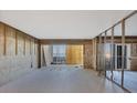 Interior under construction, showcasing an open space with ocean views and tile flooring at 2110 Benjamin Franklin Dr # 108, Sarasota, FL 34236