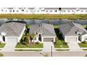An aerial view showcasing the home's location and landscaped yard within the residential community at 11380 Burgundy Dr, Venice, FL 34293