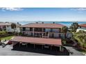 Condo building with water access and covered parking at 3420 Wild Oak Bay Blvd # 118, Bradenton, FL 34210