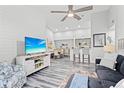 Bright living room with open floor plan and coastal decor at 4102 Central Sarasota Pkwy # 924, Sarasota, FL 34238