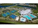 Aerial of community center, tennis courts, pool, and recreational areas at 4906 Lighthouse Bay Ln, Bradenton, FL 34211