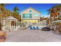Beachfront home with gazebo and seating area at 681 Casey Key Rd, Nokomis, FL 34275