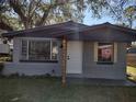 Newly painted house with a white door and wood accents at 1317 Tennessee St, Plant City, FL 33563