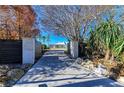 Long private driveway leading to a stunning waterfront home at 320 S Shore Dr, Sarasota, FL 34234
