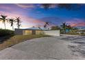 Modern home with clean lines and beautiful sunset views at 320 S Shore Dr, Sarasota, FL 34234