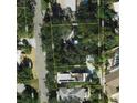 Bird's-eye view showcasing home, pool, and lush landscaping at 5453 Avenida Del Mare, Sarasota, FL 34242