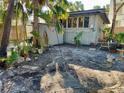 Large backyard with shed and various plants at 5453 Avenida Del Mare, Sarasota, FL 34242