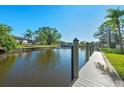 Private dock offering convenient water access at 608 69Th W Ave, Bradenton, FL 34207