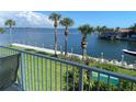 Breathtaking water views and lush tropical landscaping from balcony at 9923 Manatee W Ave # 4, Bradenton, FL 34209