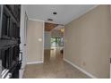 Bright entryway with tile floors, leading to the living area and other rooms at 1460 Landings Cir # 51, Sarasota, FL 34231