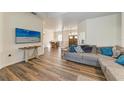 Bright living area with hardwood floors and view to dining area at 21709 Deer Pointe Xing, Bradenton, FL 34202