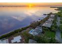 Waterfront home boasting a pool and picturesque sunset views at 3804 Bayside Dr, Bradenton, FL 34210