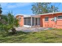 Screened patio with access to a large backyard at 2101 25Th W Ave, Bradenton, FL 34205