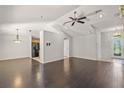 Spacious living room with dark hardwood floors and a high ceiling at 3614 E 62Nd Ave, Bradenton, FL 34203
