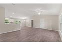 Spacious living room with tile flooring and high ceilings at 6993 Hawksbury St, Englewood, FL 34224