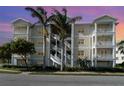 Three-story building with palm trees and balconies at 7840 34Th W Ave # 103, Bradenton, FL 34209