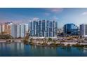 Luxury high-rise building with water and city views at 1155 N Gulfstream Ave # 703, Sarasota, FL 34236