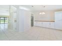 Kitchen with granite countertops and white cabinets at 2073 Damascus Ln, Punta Gorda, FL 33983