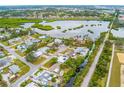 Property's aerial view showing location near water at 801 Church St, Nokomis, FL 34275