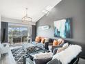 Bright living room with comfortable seating and water views at 972 Sandpiper Cir # 972, Bradenton, FL 34209