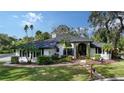 Stunning home with a spacious yard and lush landscaping at 1598 Oak N Cir, Sarasota, FL 34232