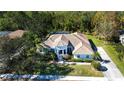 Single Gathering home with a large backyard, pool, and plenty of green space at 8532 Eagle Preserve Way, Sarasota, FL 34241