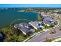 Aerial view showcasing a lakefront home in a luxury community at 991 Seascape Pl, Sarasota, FL 34240