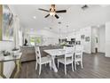 Open concept living and dining area with modern decor and hardwood floors at 2504 Florida Blvd, Bradenton, FL 34207