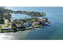 Aerial view showcasing a waterfront property and surrounding neighborhood at 333 N Shore Dr, Sarasota, FL 34234