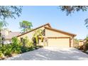 Single Gathering home with attached garage and well maintained landscaping at 3888 Shady Brook Ln, Sarasota, FL 34243