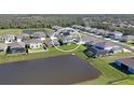 Two-story house with backyard overlooking a lake in a quiet residential neighborhood at 6107 116Th E Ave, Parrish, FL 34219