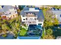 Expansive home with rooftop deck and unique backyard landscaping at 741 Jacaranda Rd, Anna Maria, FL 34216