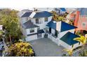 Stunning aerial view of a modern home near the beach at 741 Jacaranda Rd, Anna Maria, FL 34216