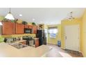 Kitchen boasts ample cabinetry and modern appliances at 4107 11Th E St, Bradenton, FL 34208