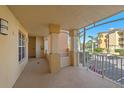 Private balcony overlooking the parking lot and neighboring buildings at 6482 Watercrest Way # 204, Lakewood Ranch, FL 34202