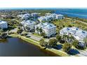 Luxury waterfront community with multiple buildings and lush landscaping at 7830 34Th W Ave # 102, Bradenton, FL 34209