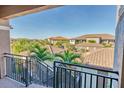 Balcony view of a community with Spanish style homes and lush landscaping at 13816 Messina Loop # 203, Bradenton, FL 34211