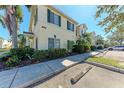 Side view of a two-story townhouse with parking at 227 Cape Harbour Loop # 103, Bradenton, FL 34212