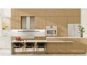 Modern kitchen with light wood cabinets and marble countertops at 1305 4Th St # 502A, Sarasota, FL 34236