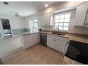 Spacious kitchen with granite countertops and stainless steel appliances at 3520 57Th Avenue W Cir # 10, Bradenton, FL 34210