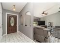 Inviting entryway with a view into the living room at 4239 Durant St, Port Charlotte, FL 33948