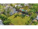 Aerial view showing the house, pool, and large backyard at 4564 Iola Dr, Sarasota, FL 34231