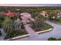 Stunning home situated on a tree-lined street in a desirable neighborhood at 7041 Beechmont Ter, Lakewood Ranch, FL 34202