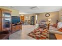 Spacious living room featuring a comfortable seating area and wood flooring at 584 Beverly Rd, Venice, FL 34293