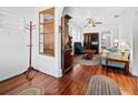 Living room with hardwood floors, fireplace, and comfortable seating at 1323 18Th W St, Bradenton, FL 34205