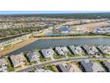 Exclusive community featuring waterfront homes and lush landscaping at 8544 Pavia Way, Bradenton, FL 34202