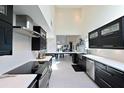 Modern kitchen with stainless steel appliances and white cabinetry at 114 Tidy Island Blvd, Bradenton, FL 34210